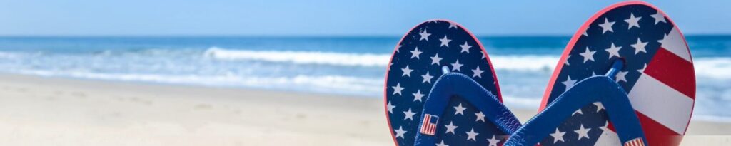 a pair of flip flops with the american flag painted on them